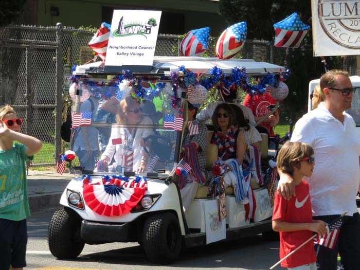 Neighborhood Council Valley Village in golf cart at parade