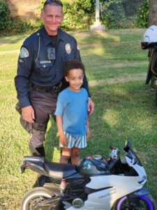 Officer and boy at NNO 2024