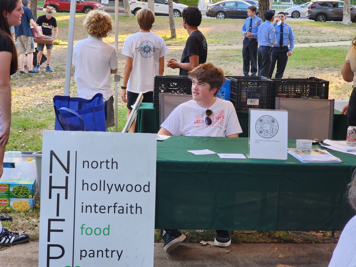 Interfaith food pantry table at NNO 2024